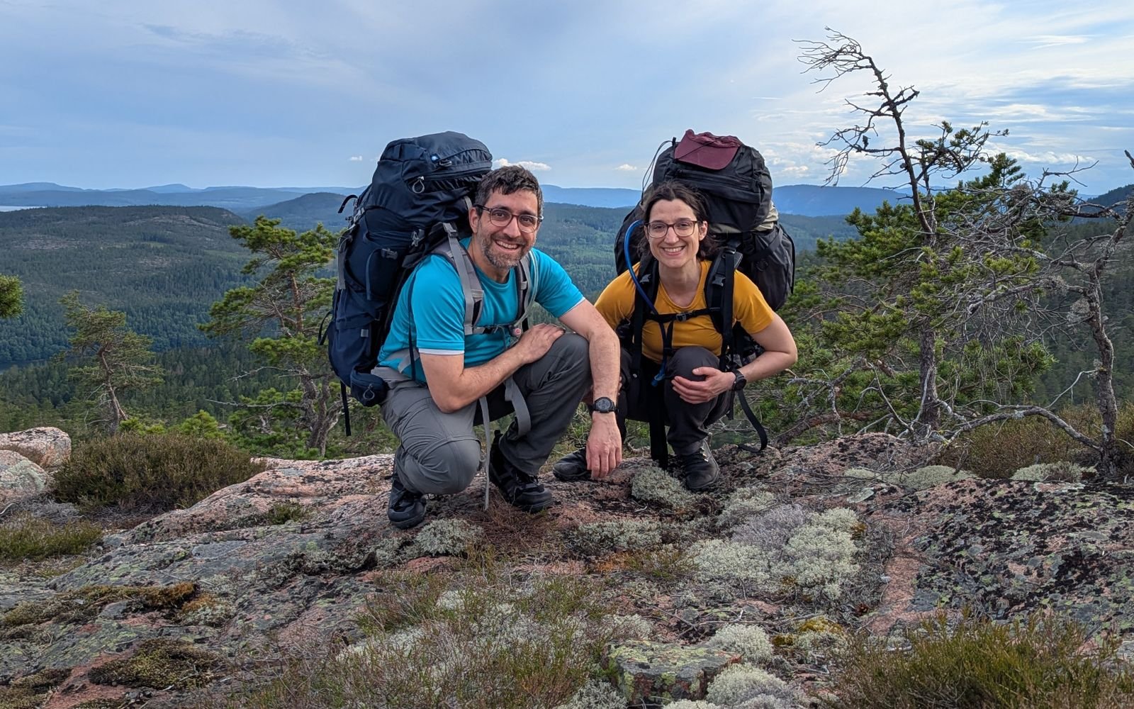 The Nordic BioConsult team on a lichen-covered summit overlooking boreal forest